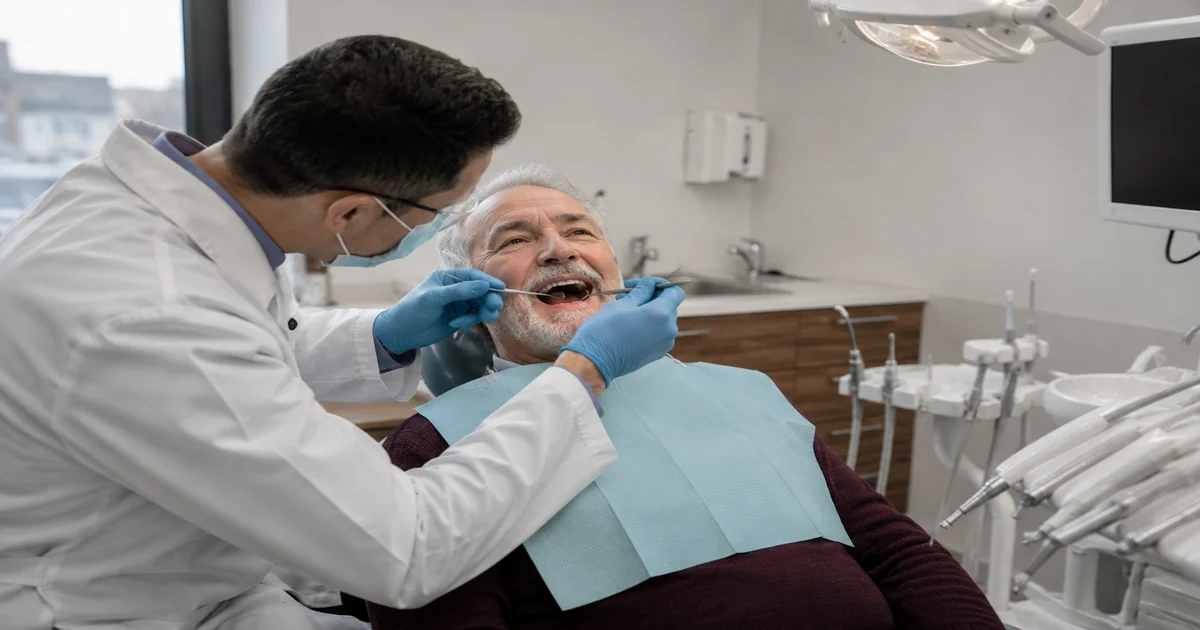 a picture of a canadian senior recieving dental care
