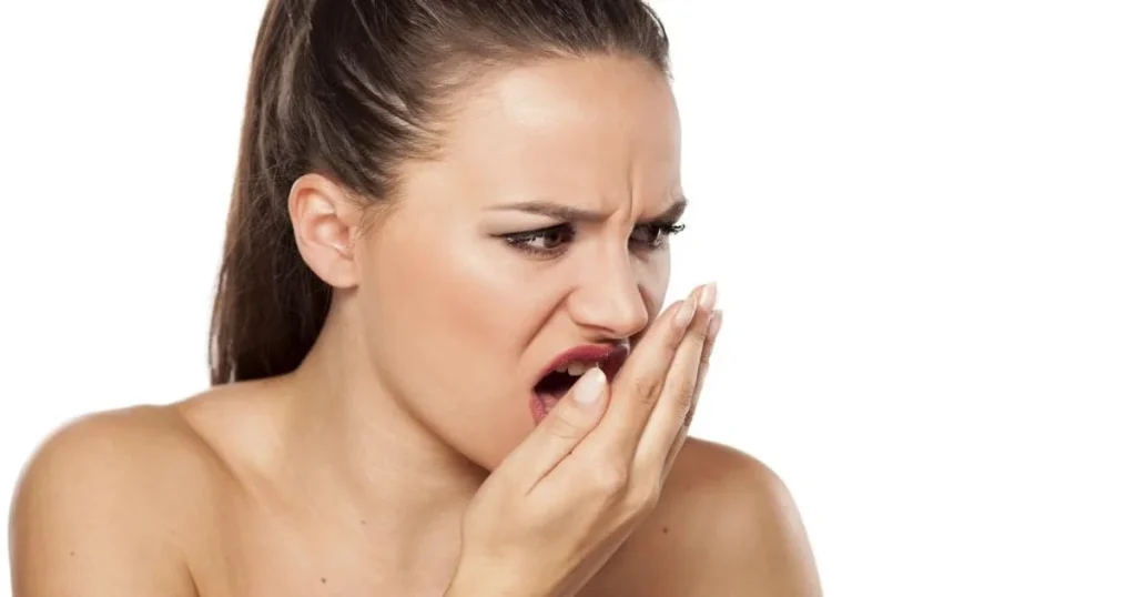 A picture of a woman with bad breath